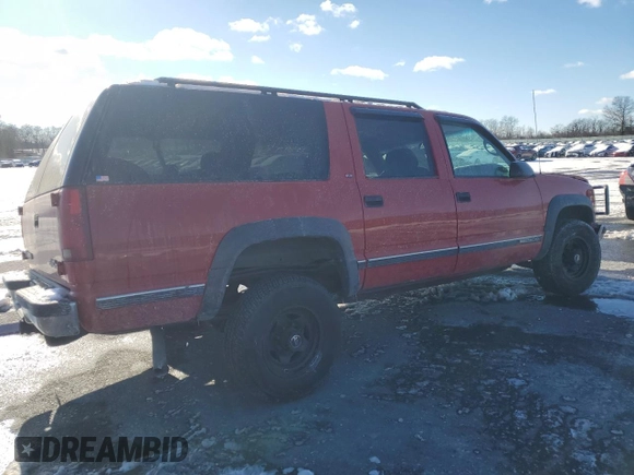 1997 GMC Suburban z VIN 3GKGK26J9VG515459, wystawiony jako Copart lot #87515385 z przebiegiem 205 982 mil mil oraz Szkoda całkowita • Salvage title. Historia ofert i sprzedaży dostępna na DreamBid. Obrazek 3.