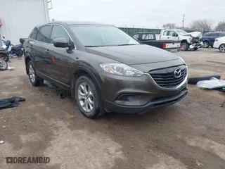 2015 Mazda CX-9 Touring with VIN JM3TB2CA5F0469348, listed as a IAAI auction lot 41516084 with NaN miles. Bid and sale history available at carsss.com. Image 1.