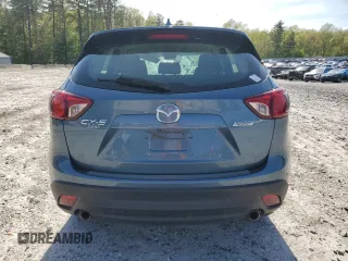 2016 Mazda CX-5 Sport with VIN JM3KE4BY8G0745522, listed as a Copart auction lot 56621825 with 98,757 mi miles and Salvage title. Bid and sale history available at DreamBid. Image 6.