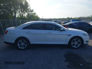 2013 Ford Taurus SEL z VIN 1FAHP2E88DG214441, wystawiony jako IAAI lot #42232859 z przebiegiem 122 388 mil mil oraz . Historia ofert i sprzedaży dostępna na DreamBid. Obrazek 13.