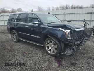 2017 Cadillac Escalade Luxury with VIN 1GYS4BKJ2HR236875, listed as a Copart auction lot 52328095 with 103,335 mi miles and Salvage title. Bid and sale history available at DreamBid. Image 4.