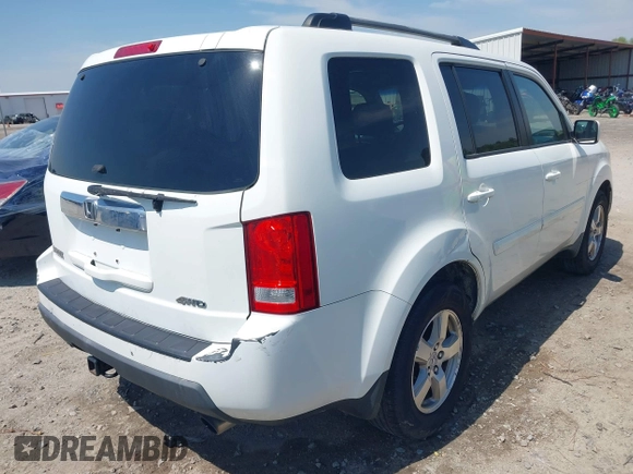 2009 Honda Pilot EX-L with VIN 5FNYF48619B022699, listed as a IAAI auction lot 42016173 with 204,190 mi miles and . Bid and sale history available at carsss.com. Image 4.