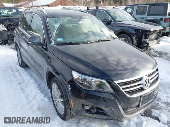 2011 Volkswagen Tiguan SE with VIN WVGBV7AX7BW515555, listed as a IAAI auction lot 41627913 with 49,424 mi miles and . Bid and sale history available at DreamBid. Image 1.