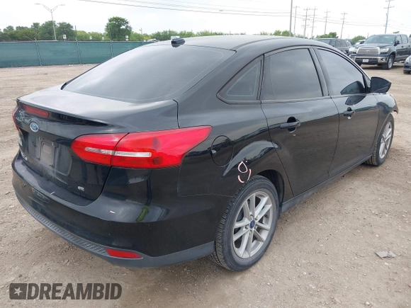 2018 Ford Focus SE with VIN 1FADP3F28JL302634, listed as a IAAI auction lot 42103219 with 71,682 mi miles and . Bid and sale history available at DreamBid. Image 4.