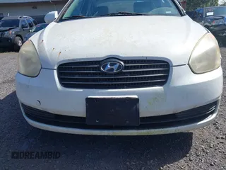 2009 Hyundai Accent Auto GLS with VIN KMHCN46C19U368700, listed as a IAAI auction lot 41590180 with 165,836 mi miles. Bid and sale history available at carsss.com. Image 18.