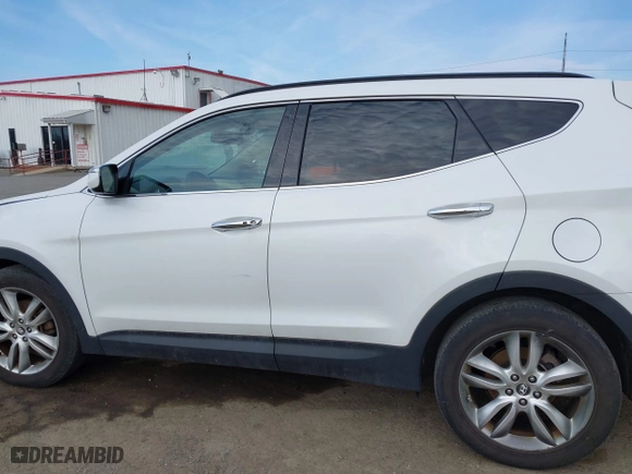 2013 Hyundai Santa Fe 2.0T Sport with VIN 5XYZUDLA8DG013103, listed as a IAAI auction lot 41916256 with 146,427 mi miles. Bid and sale history available at carsss.com. Image 14.