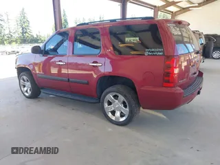 2007 Chevrolet Tahoe LS with VIN 1GNFC13C07R256584, listed as a IAAI auction lot 42678748 with 214,040 mi miles and . Bid and sale history available at DreamBid. Image 3.