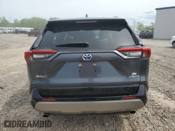 2023 Toyota RAV4 Hybrid SE with VIN JTM16RFVXPD088729, listed as a Copart auction lot 57879395 with 33,249 mi miles and Salvage title. Bid and sale history available at DreamBid. Image 6.