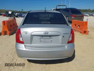 2008 Hyundai Accent GLS with VIN KMHCN46CX8U214890, listed as a IAAI auction lot 41843006 with 179,550 mi miles. Bid and sale history available at carsss.com. Image 16.