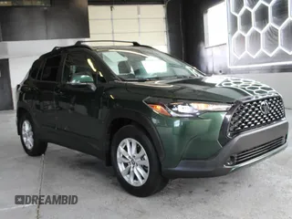 2022 Toyota Corolla Cross LE with VIN 7MUBAABG2NV037163, listed as a Copart auction lot 65779015 with 23,400 mi miles and Salvage title. Bid and sale history available at DreamBid. Image 1.