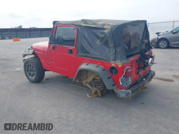 2001 Jeep Wrangler Sport z VIN 1J4FA49S31P335680, wystawiony jako IAAI lot #42471312 z przebiegiem 212 927 mil mil oraz . Historia ofert i sprzedaży dostępna na DreamBid. Obrazek 3.