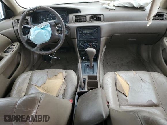 1998 Toyota Camry LE z VIN 4T1BF28K3WU068735, wystawiony jako Copart lot #44548355 z przebiegiem Nie podano mil oraz Szkoda całkowita • Salvage title. Historia ofert i sprzedaży dostępna na DreamBid. Obrazek 8.