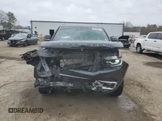 2022 Jeep Wagoneer Series III with VIN 1C4SJUDTXNS115301, listed as a Copart auction lot 89125845 with 60,674 mi miles and Salvage title. Bid and sale history available at DreamBid. Image 5.