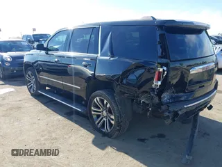 2019 GMC Yukon Denali with VIN 1GKS2CKJ4KR191886, listed as a IAAI auction lot 41198227 with 74,325 mi miles. Bid and sale history available at carsss.com. Image 3.