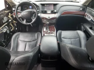 2015 Infiniti Q70 z VIN JN1BY1PR6FM831034, wystawiony jako Copart lot #51889835 z przebiegiem 128 220 mil mil oraz Szkoda całkowita • Salvage title. Historia ofert i sprzedaży dostępna na DreamBid. Obrazek 8.