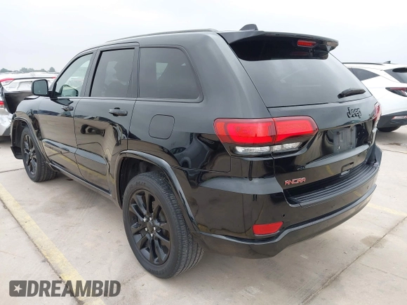 2021 Jeep Grand Cherokee Laredo X with VIN 1C4RJEAG8MC714539, listed as a IAAI auction lot 42190686 with 59,359 mi miles and . Bid and sale history available at DreamBid. Image 3.