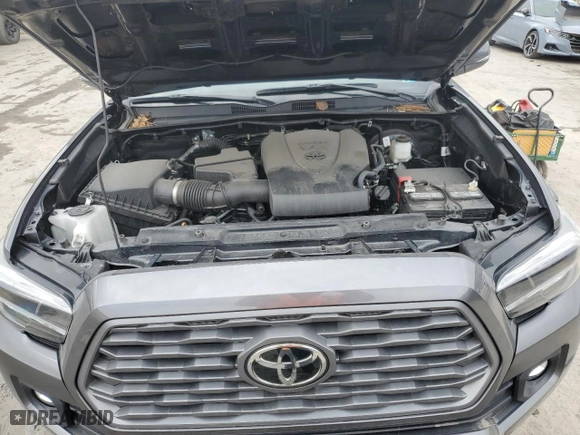 2023 Toyota Tacoma 4WD SR with VIN 3TMCZ5AN0PM582974, listed as a Copart auction lot 48390905 with 26,916 mi miles and Salvage Title. Bid and sale history available at carsss.com. Image 11.