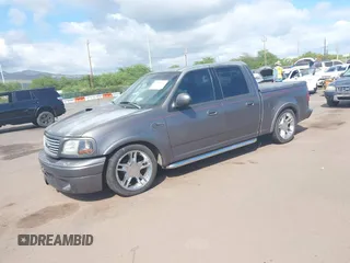 2002 Ford F-150 Harley Davidson with VIN 1FTRW07312KC88379, listed as a IAAI auction lot 41657219 with 1 mi miles. Bid and sale history available at carsss.com. Image 17.