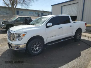 2018 Nissan Titan S with VIN 1N6AA1E57JN529748, listed as a Copart auction lot 49182075 with 150,897 mi miles and Salvage title. Bid and sale history available at DreamBid. Image 1.