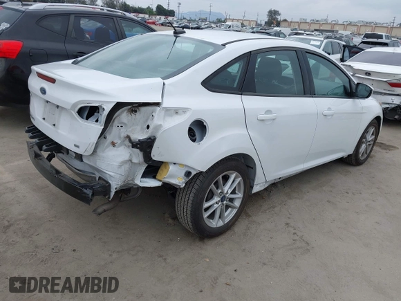 2016 Ford Focus SE with VIN 1FADP3F24GL346445, listed as a IAAI auction lot 42101322 with 30,354 mi miles. Bid and sale history available at carsss.com. Image 4.