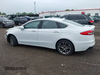 2020 Ford Fusion Titanium with VIN 3FA6P0RUXLR139574, listed as a IAAI auction lot 42299070 with 92,751 mi miles and . Bid and sale history available at DreamBid. Image 15.