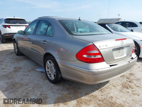 2006 Mercedes-Benz E-Class 3.5L with VIN WDBUF56J16A795803, listed as a IAAI auction lot 40613021 with 1 mi miles. Bid and sale history available at carsss.com. Image 3.