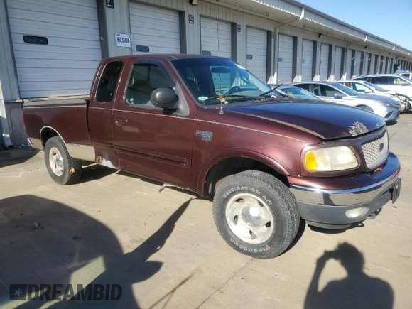 2000 Ford F-150 XL with VIN 1FTRX18W7YNA67100, listed as a Copart auction lot 78982114 with 0 mi miles and Salvage Title. Bid and sale history available at carsss.com. Image 4.