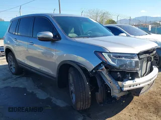 2023 Honda Passport EX-L with VIN 5FNYF8H50PB036640, listed as a IAAI auction lot 42536022 with 1,658 mi miles and . Bid and sale history available at DreamBid. Image 1.