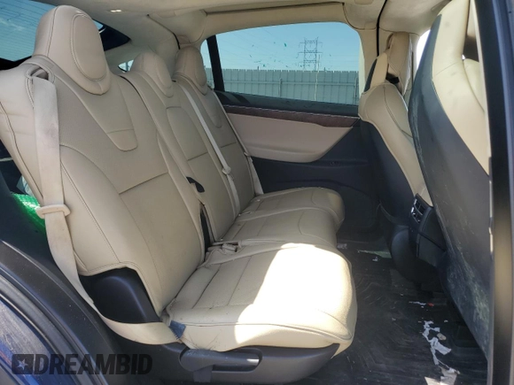 2017 Tesla Model X 90D with VIN 5YJXCDE23HF044790, listed as a Copart auction lot 52376565 with 105,712 mi miles and Salvage Title. Bid and sale history available at DreamBid. Image 11.