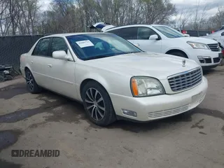 2003 Cadillac DeVille z VIN 1G6KD54Y13U208351, wystawiony jako IAAI lot #41889713 z przebiegiem 132 774 mil mil oraz . Historia ofert i sprzedaży dostępna na DreamBid. Obrazek 1.