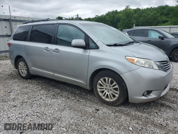 2016 Toyota Sienna XLE with VIN 5TDYK3DC8GS707910, listed as a Copart auction lot 58418535 with 161,527 mi miles and Salvage title. Bid and sale history available at DreamBid. Image 4.