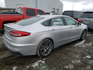 2019 Ford Fusion Hybrid Titanium with VIN 3FA6P0RU4KR182029, listed as a Copart auction lot 45426203 with 71,021 mi miles. Bid and sale history available at carsss.com. Image 3.