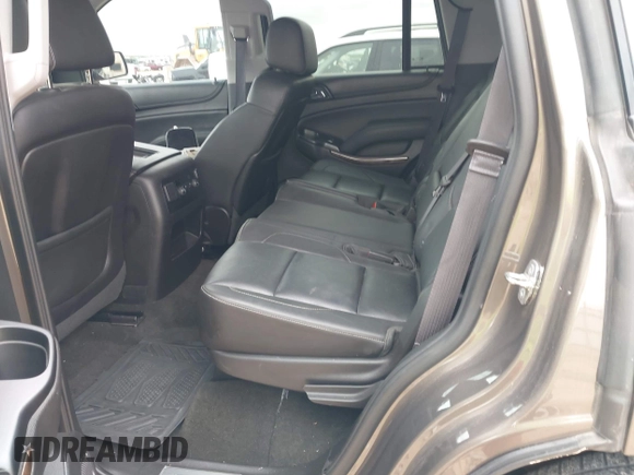 2015 Chevrolet Tahoe LT z VIN 1GNSCBKC2FR685780, wystawiony jako IAAI lot #42354130 z przebiegiem 101 617 mil mil oraz . Historia ofert i sprzedaży dostępna na DreamBid. Obrazek 8.