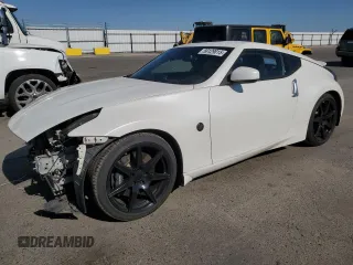 2012 Nissan 370Z z VIN JN1AZ4EH2CM565026, wystawiony jako Copart lot #56129015 z przebiegiem 113 456 mil mil oraz Szkoda całkowita • Salvage title. Historia ofert i sprzedaży dostępna na DreamBid. Obrazek 1.