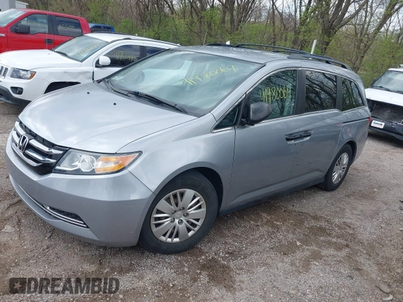 2016 Honda Odyssey LX with VIN 5FNRL5H23GB028338, listed as a IAAI auction lot 41980064 with 186,403 mi miles and . Bid and sale history available at DreamBid. Image 2.