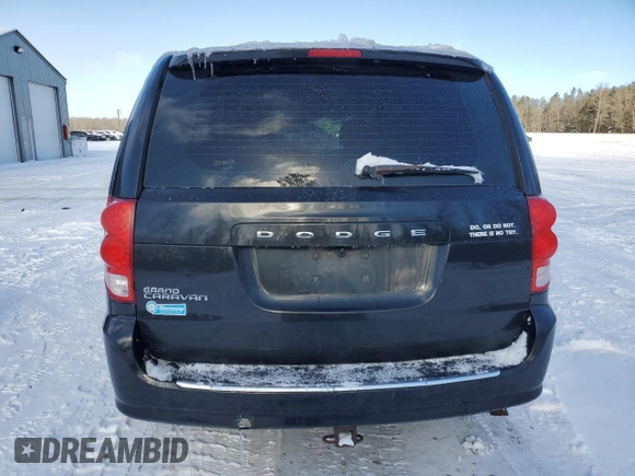 2014 Dodge Grand Caravan SE 30th Anniversary with VIN 2C4RDGBG9ER467543, listed as a Copart auction lot 87100594 with 393,038 mi miles and Clean Title. Bid and sale history available at DreamBid. Image 6.