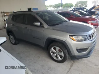 2019 Jeep Compass Altitude with VIN 3C4NJDBB3KT599863, listed as a Copart auction lot 57561965 with 72,482 mi miles and Salvage title. Bid and sale history available at DreamBid. Image 4.