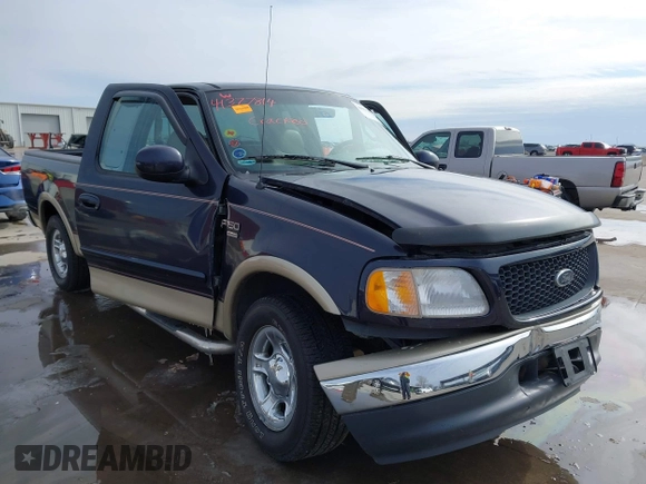 2000 Ford F-150 XL with VIN 1FTRX17L2YNB85627, listed as a IAAI auction lot 41377814 with 123,740 mi miles. Bid and sale history available at carsss.com. Image 12.