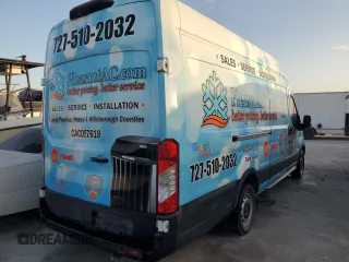 2021 Ford Transit Cargo with VIN 1FTBW3X84MKA65772, listed as a Copart auction lot 74115594 with Not Provided miles and Salvage Title. Bid and sale history available at DreamBid. Image 3.
