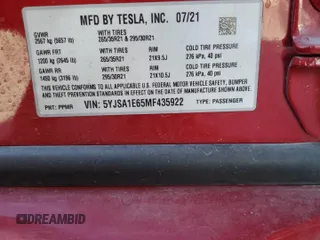 2021 Tesla Model S Plaid z VIN 5YJSA1E65MF435922, wystawiony jako Copart lot #77417854 z przebiegiem Nie podano mil oraz Szkoda całkowita • Salvage title. Historia ofert i sprzedaży dostępna na DreamBid. Obrazek 15.