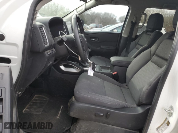 2023 Nissan Frontier SV with VIN 1N6ED1FJ9PN653677, listed as a Copart auction lot 43245835 with 20,594 mi miles and Salvage title. Bid and sale history available at DreamBid. Image 7.