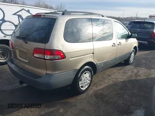 2001 Toyota Sienna CE with VIN 4T3ZF19C91U351141, listed as a IAAI auction lot 41608484 with 325,657 mi miles. Bid and sale history available at carsss.com. Image 4.