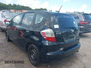 2009 Honda Fit with VIN JHMGE88249S053398, listed as a IAAI auction lot 42818376 with 242,218 mi miles and . Bid and sale history available at DreamBid. Image 3.