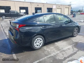 2019 Toyota Prius L Eco with VIN JTDKARFU8K3082503, listed as a IAAI auction lot 41809373 with 247,315 mi miles. Bid and sale history available at carsss.com. Image 4.