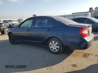 2004 Toyota Camry LE z VIN 4T1BE32K64U329578, wystawiony jako Copart lot #85528744 z przebiegiem Nie podano mil oraz Czysty tytuł • Clean title. Historia ofert i sprzedaży dostępna na DreamBid. Obrazek 2.