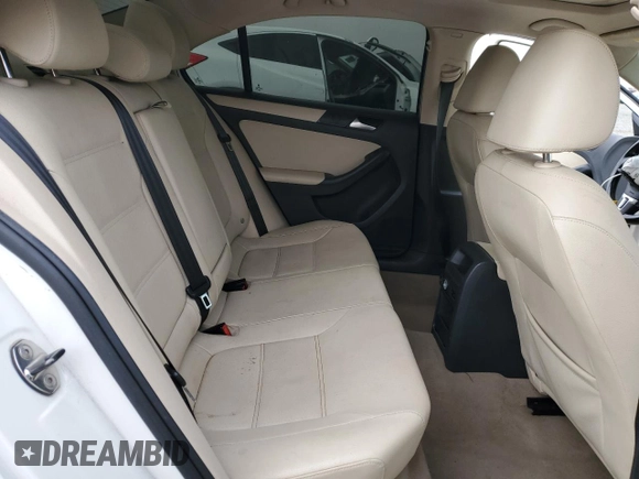 2012 Volkswagen Jetta SE with VIN 3VWDP7AJ9CM364672, listed as a Copart auction lot 61309775 with 124,965 mi miles and Salvage title. Bid and sale history available at DreamBid. Image 10.