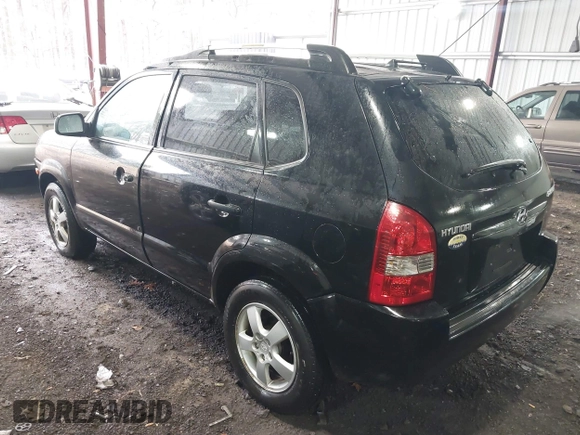 2005 Hyundai Tucson GL with VIN KM8JM12B75U072080, listed as a IAAI auction lot 41779464 with 191,771 mi miles. Bid and sale history available at carsss.com. Image 3.