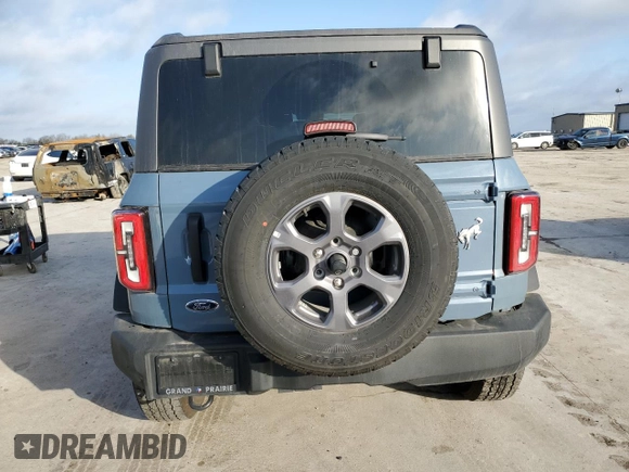 2024 Ford Bronco Big Bend z VIN 1FMDE7BH7RLA03788, wystawiony jako Copart lot #48574295 z przebiegiem 10 597 mil mil oraz Szkoda całkowita • Salvage title. Historia ofert i sprzedaży dostępna na DreamBid. Obrazek 6.