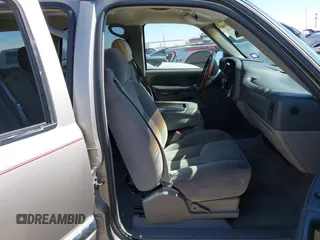 2003 GMC Yukon SLT with VIN 1GKEC13V33R298333, listed as a IAAI auction lot 41582447 with 166,047 mi miles. Bid and sale history available at carsss.com. Image 5.