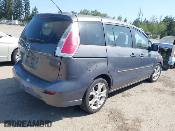 2009 Mazda Mazda5 Sport with VIN JM1CR293890352218, listed as a IAAI auction lot 42121590 with 168,302 mi miles. Bid and sale history available at carsss.com. Image 4.